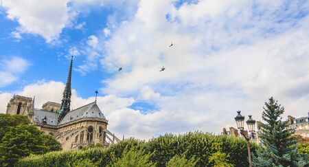 Paris, FRANCE - july 11, 2017: Air Force helicopters fly over the Notre-Dame Cathedral in Paris, France, to repeat their national celebrations on July 14のeditorial素材