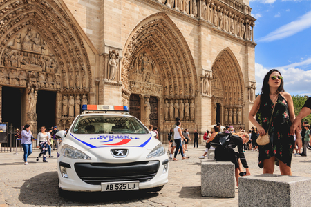 Paris, FRANCE - july 11, 2017: police car is parked in front of the Notre-Dame Cathedral in Paris, Franceのeditorial素材