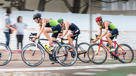 Saint Gilles Croix de Vie, France - September 10, 2016 : Final triathlon championship of France in the category D3 - frontrunners for a road bike raceのeditorial素材