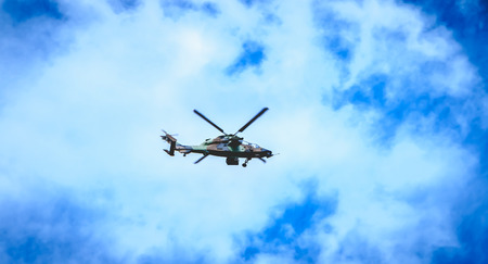 Paris, FRANCE - july 11, 2017: helicopter Eurocopter EC665 Air Force Tiger flies over the French capital in order to train for the parade on 14 July, the day of the French national dayのeditorial素材