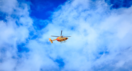Paris, FRANCE - july 11, 2017: Helicopter EC 135 of the Civil Security flying over the French capital in order to train for the parade on 14 July, the day of the French national holidayのeditorial素材