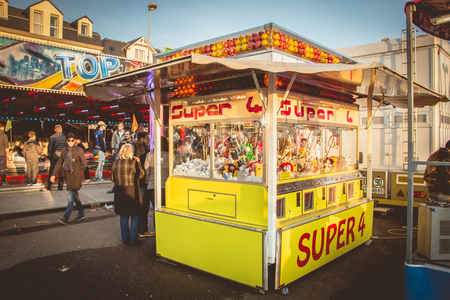 SABLES D OLONNE, FRANCE - November 27, 2016: In a traditional funfair a claw machine allows to win stuffed animals and souvenirsのeditorial素材