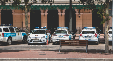VANLENCIA, SPAIN - june 16, 2017: police cars parked in front of a police station in the center of Valencia, Spainのeditorial素材