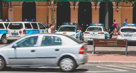 VANLENCIA, SPAIN - june 16, 2017: police cars parked in front of a police station in the center of Valencia, Spainのeditorial素材