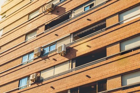 VALENCIA, SPAIN - June 18, 2017 : architectural detail of typical residential buildings in red brick cityのeditorial素材