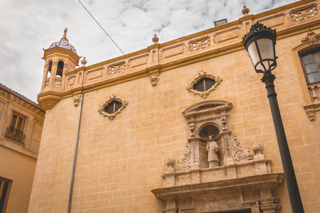architectural detail of the facade of the Cathedral of St. Mary of Valenciaの写真素材