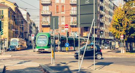 MILAN, ITALY - November 03, 2017 : two tramway company Azienda Trasporti Milanesi stopped at a junctionのeditorial素材