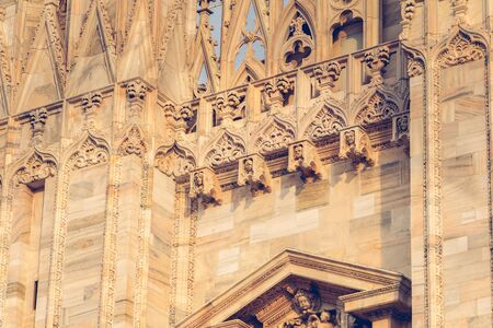 Exterior sculpture detail of the facade of the Cathedral of the Nativity of the Blessed Virgin of Milan, Piazza del Duomo, Italyの写真素材