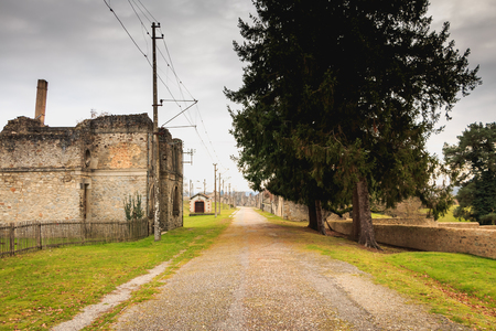 ORADOUR SUR GLANE, FRANCE - December 03, 2017 : in the village streets, remains in ruins of houses destroyed by fires during the massacre of the population by the German army at the end of World War IIのeditorial素材