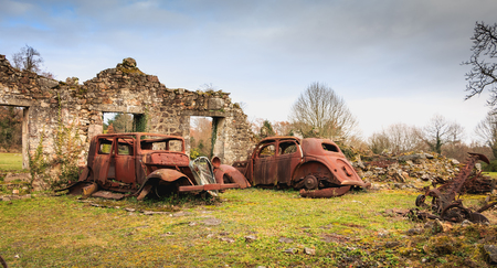 ORADOUR SUR GLANE, FRANCE - December 03, 2017 : remains of a burnt car remained in the state since the massacre of the population by the German army on June 10, 1944のeditorial素材