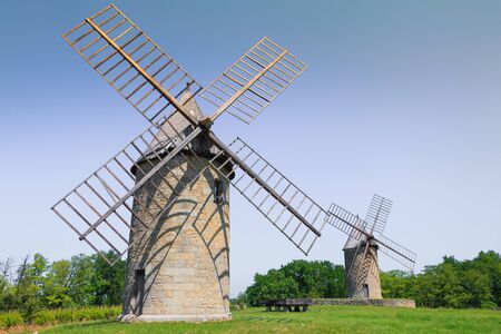 architectural details of the Moulins de Calon during the spring, 5 windmills with canvas wings built...