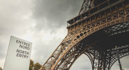 sign indicates the north entry of the Eiffel tower in Paris, Franceの写真素材