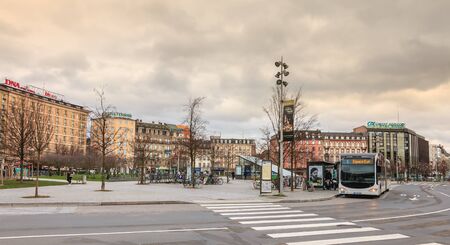 Strasbourg, France - December 28, 2017 : street atmosphere on the train station square (Place de la Gare) where people walk on a winter dayのeditorial素材