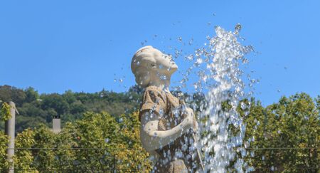 Bilbao, Spain - July 19, 2016 : statue of Melpomene, in Greek mythology the muse of singing, carved by Enrique Barros, under the sun on a summer dayのeditorial素材