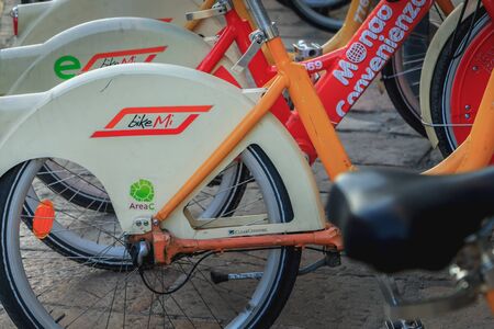 Milan, Italy - November 03, 2017 : close-up in autumn of a BikeMi station, the public self-service bicycle system in Milan, Italy. Commissioned by the municipality on December 3, 2008のeditorial素材