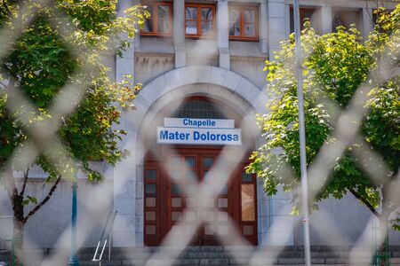 Lourdes, France - June 22, 2017 : view of the entrance to the chapel of the mother of pain (Mater dolorosa in Latin) in the Lourdes sactuary on a summer dayのeditorial素材