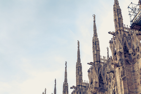 exterior sculpture detail of the facade of the Cathedral of the Nativity of the Blessed Virgin of Milan, Piazza del Duomo, Italyの写真素材