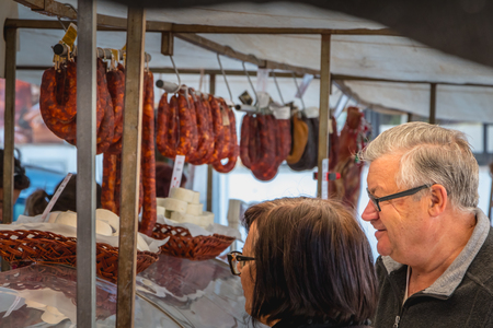 Quarteira, Portugal - May 2, 2018: Small outdoor market where local producers sell their goods on a spring dayのeditorial素材