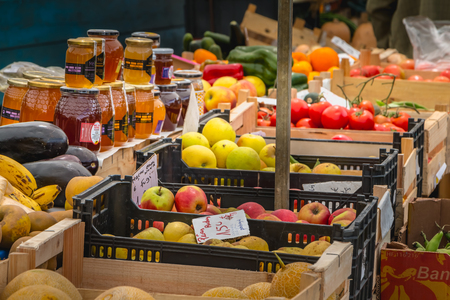 Quarteira, Portugal - May 2, 2018: shopkeeper who sells fruits and vegetables at the municipal market of the city on a spring dayのeditorial素材