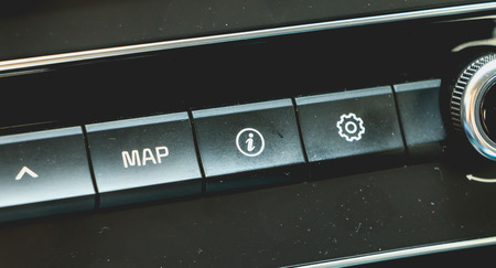 MAP button and Information on the dashboard of a modern carの写真素材