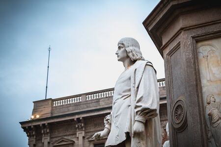 Milan, Italy - November 2, 2017: Architectural detail of a statue to the glory of Leonardo da Vinci...