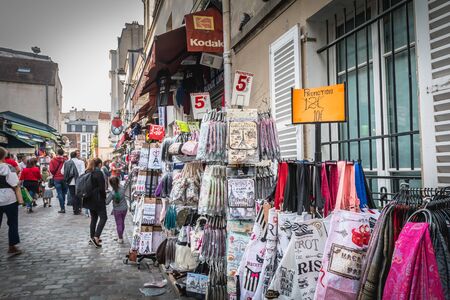 Paris, France - October 6, 2018: Storefront of souvenir shops on a fall day where some tourists come to buy gifts in memory of their visit to Montmartreのeditorial素材