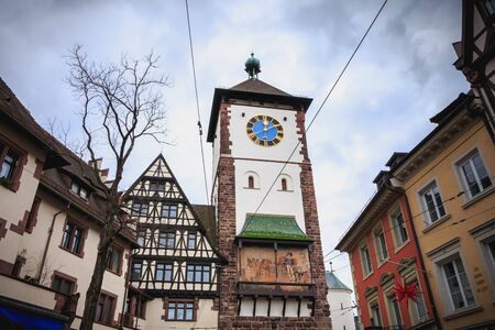 Freiburg im Breisgau, Germany - December 31, 2017: Architectural detail of an ancient city gate, the door Swabian - Schwabentor - built in the Middle Ages, a winter dayのeditorial素材