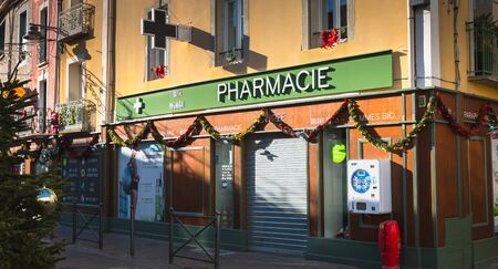 Marseillan, France - December 30, 2018: front of a pharmacy in the city center on a winter dayのeditorial素材