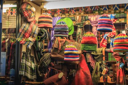 Milan, Italy - November 3, 2017: Showcase of a hat and warm clothing store in the historic city...