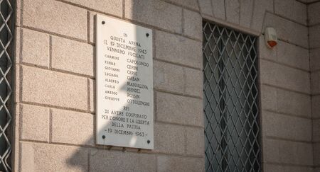 Milan, Italy - November 3, 2017: On a wall of the Civica Stadium Arena, a street sign indicates the names of people fleeing there on December 19, 1943のeditorial素材