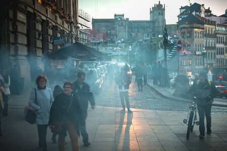 Porto, Portugal - November 30, 2018: Street atmosphere in front of the Porto train station where people walk one autumn eveningのeditorial素材