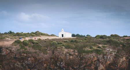 La Meule, France - September 18, 2018: Tourists visiting the surroundings of La Meule chapel near the marina on the island of Yeuのeditorial素材