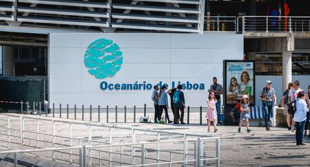 Lisbon, Portugal - May 7, 2018: people walking next to the Oceanarium of Lisbon a spring day. It is...