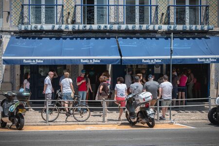 Lisbon, Portugal - May 7, 2018: People queuing in front of the famous bakery Pasteis Belem to buy the Pastel de Nata a spring dayのeditorial素材