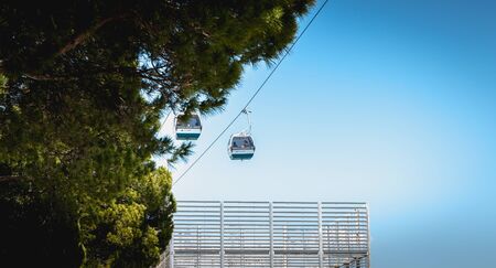 Lisbon, Portugal - May 7, 2018: Telecabine Lisboa at Park of Nations (Parque das Nacoes). Cable car in the modern district of Lisbon over the Tagus river on a spring dayのeditorial素材