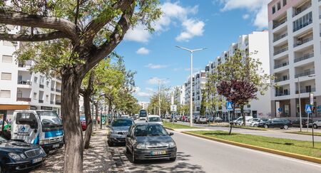 Quarteira, Portugal - May 1, 2018: Architecture detail of a typical New Town building on a spring dayのeditorial素材