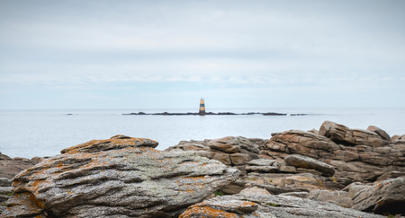 remnant of a semaphore at Pointe du But on the wild coast of the Yeu Islandの写真素材
