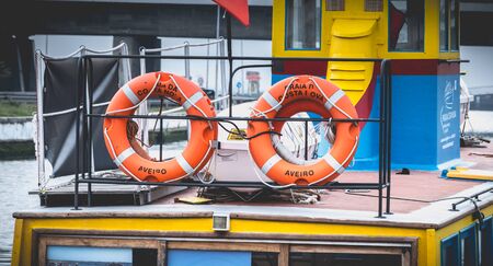 Aveiro, Portugal - May 7, 2018: Tourist transport boat docked at the end of the day on a spring dayのeditorial素材