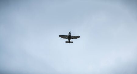 Port Joinville, France - September 16, 2018: Small passenger plane flying over Isle of Yeu near France on a fall dayのeditorial素材