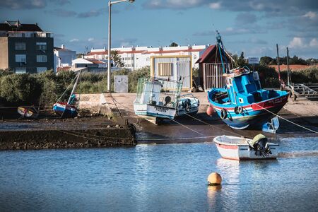 Tavira, Portugal - April 30, 2018: view of the small fishing ports with its boats on a spring dayのeditorial素材