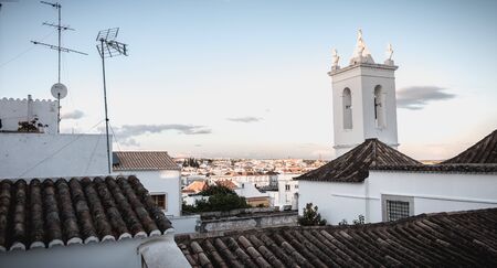 Tavira, Portugal - April 30, 2018: Architectural detail of the Church of Santa Maria do Castelo on a...