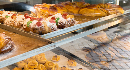 succulent Portuguese pastries displayed in the pastry cook's window in Portoの写真素材