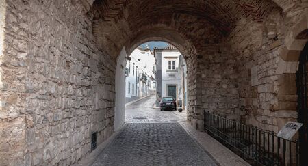 Faro, Portugal - May 1, 2018: Architectural detail of the arch of the city on a spring day, a medieval gatewayのeditorial素材