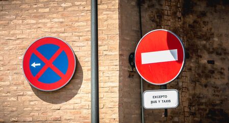 No entry road sign except buses and taxis in Spanish in Spainの写真素材