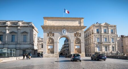 Montpellier, France - January 2, 2019: Architecture detail of the Arc de Triomphe and its street atmosphere on a winter dayのeditorial素材