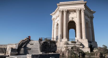 Montpellier, France - January 2, 2019: architecture detail of Saint-Clement aqueduct dating from 1766 where people are walking on a winter dayのeditorial素材