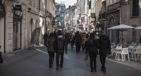 Montpellier, France - January 2, 2019: Street atmosphere and architecture in a shopping street in...