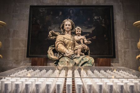 Alcobaca, Portugal - April 13, 2019: Statue of the Blessed Virgin Mary in the medieval Romanesque...
