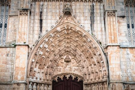 Batalha, Portugal - April 13, 2019: Architectural detail of the Monastery of Santa Maria da Vitoria...