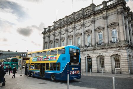 Dublin, Ireland - February 13, 2019: Double decker Irish bus that parks in front of Heuston train...